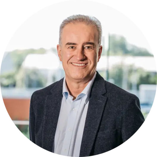 Philip de Lisle in casual jacket, indoors